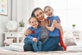 Mom and her daughters are playing Royalty Free Stock Photo