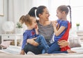 Mom and her daughters are playing Royalty Free Stock Photo