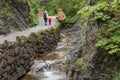 Mom and her little daughter go hiking in the national park in Zakopane in the Tatra Mountains