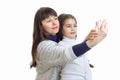 Mom with her little daughter make photo on the phone and smiling Royalty Free Stock Photo