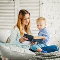 Mom and her Son Reading a Book Royalty Free Stock Photo