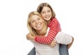 Mom with her teenage daughter hugging and laughing Royalty Free Stock Photo