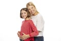 Mom with her teenage daughter hugging and laughing Royalty Free Stock Photo