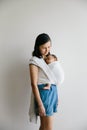 A mum holding her baby. Baby sleeping in sling. Royalty Free Stock Photo