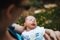 Mom holding newborn baby boy in her arms Royalty Free Stock Photo