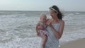 Mom and daughter on the sea.