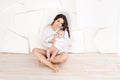 Mom holds newborn baby in her arms at home, happy loving family concept, mother`s day Royalty Free Stock Photo