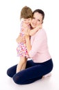 Mom hugging with a small, beautiful child Royalty Free Stock Photo