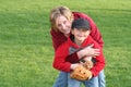 Mom Hugging Young Sports Son Royalty Free Stock Photo