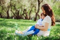 mom hugs sad toddler son outdoor on the walk. Happy loving family Royalty Free Stock Photo