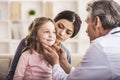 Mom with kid at the doctor. Royalty Free Stock Photo