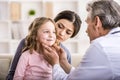 Mom with kid at the doctor. Royalty Free Stock Photo