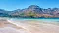 Mom and kid enjoy Hout Bay Beach in Cape Town