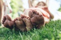Mom and kid lying on ground in park Royalty Free Stock Photo