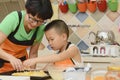 Mom and kid making pizza Royalty Free Stock Photo