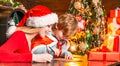 Mom and kid play together christmas eve. Happy family. Family holiday. Mother and little child boy adorable friendly
