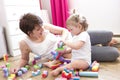 Mom and kid playing block toys at home Royalty Free Stock Photo