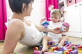 Mom and kid playing block toys at home Royalty Free Stock Photo