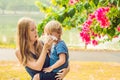 Mom looks at his son who is allergic to pollen Royalty Free Stock Photo