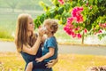 Mom looks at his son who is allergic to pollen Royalty Free Stock Photo