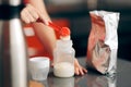 Mom Preparing Formula in Baby Bottle at Home Royalty Free Stock Photo