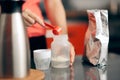 Mom Preparing Formula in Baby Bottle at Home Royalty Free Stock Photo