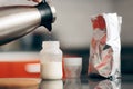 Mom Preparing Formula in Baby Bottle at Home Royalty Free Stock Photo