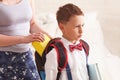 Mom puts a Packed school lunch in a plastic box for her son Royalty Free Stock Photo