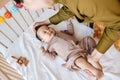 Mom putting her baby to sleep Royalty Free Stock Photo