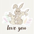 Mom rabbit hugs her children and around the grass and text love you