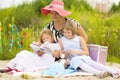 Mom reading a book to his daughters