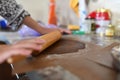 Mom rolls dough. chocolate dough. Hands working with dough preparation recipe bread. Female hands making dough for pizza. Woman`s Royalty Free Stock Photo