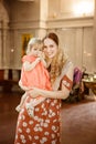 Mom and daughter in Church religion in family