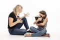 Mom scolds the daughter of a teenager. The conflict of generations. White background