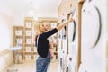 Mom shows her daughter a washing machine Royalty Free Stock Photo