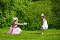 Mother and daughter in a summer park.