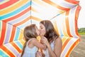 Mom with a little daughter with an umbrella Royalty Free Stock Photo