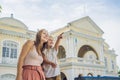 Mom and son on background of Old Town Hall in George Town in Penang, Malaysia. The foundation stone was laid in 1879