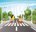 Mom with Son Crossing Road On Crosswalk, Road Markings, Sidewalk for Pedestrians, Trees and Traffic Lights Royalty Free Stock Photo