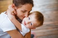 Mom and son do yoga in a summer park. Healthy lifestyle. Royalty Free Stock Photo