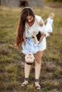 Mom and son have fun together. Enjoying life together concept. Happy mother and son having fun outdoors on a sunny summer day.