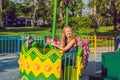 Mom and son having fun at an amusement park Royalty Free Stock Photo