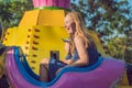 Mom and son having fun at an amusement park Royalty Free Stock Photo