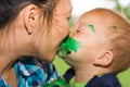 Mom & Son with Kiss & Cake Royalty Free Stock Photo