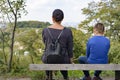 Mom and son and look at the city from a height. Rear view, evening time Royalty Free Stock Photo