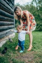 Mom and son are looking at the kittens Royalty Free Stock Photo