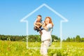 Mom and son play in the field and dream of a home Royalty Free Stock Photo