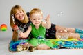 Mom and son playing with soap bubbles Royalty Free Stock Photo