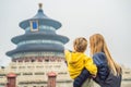 Mom and son travelers in the Temple of Heaven in Beijing. One of the main attractions of Beijing. Traveling with family Royalty Free Stock Photo