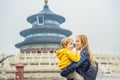 Mom and son travelers in the Temple of Heaven in Beijing. One of the main attractions of Beijing. Traveling with family Royalty Free Stock Photo